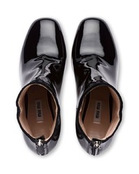 Черные кожаные ботильоны от Miu Miu