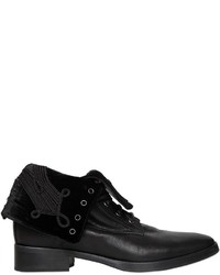 Черные кожаные ботинки с вышивкой