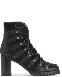 Женские черные кожаные ботинки с шипами от Christian Louboutin