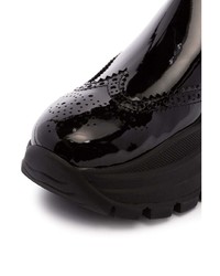 Женские черные кожаные ботинки челси от Prada