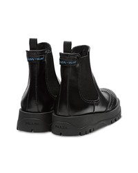 Женские черные кожаные ботинки челси от Prada