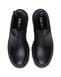 Женские черные кожаные ботинки челси от Prada
