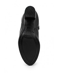 Черные кожаные ботфорты от Schutz