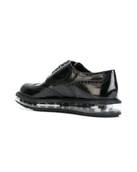 Черные кожаные броги от Prada