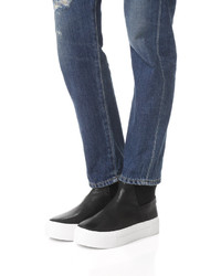 Женские черные кожаные кеды от DKNY