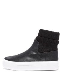 Женские черные кожаные кеды от DKNY