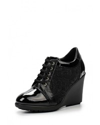 Черные кожаные кроссовки на танкетке от Botticelli Limited