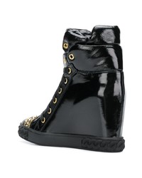 Черные кожаные кроссовки на танкетке от Casadei