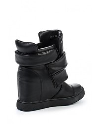 Черные кожаные кроссовки на танкетке от Donna Moda