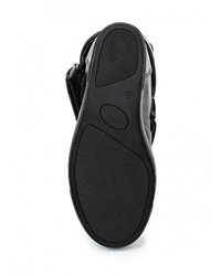 Черные кожаные кроссовки на танкетке от Donna Moda