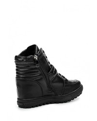 Черные кожаные кроссовки на танкетке от Donna Moda