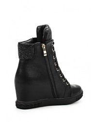 Черные кожаные кроссовки на танкетке от Elcherry