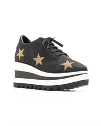 Черные кожаные кроссовки на танкетке от Stella McCartney