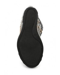 Черные кожаные кроссовки на танкетке от Guapissima