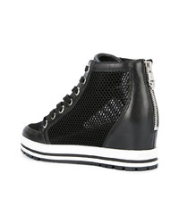 Черные кожаные кроссовки на танкетке от Marc Cain