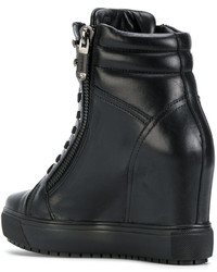 Черные кожаные кроссовки на танкетке от Baldinini