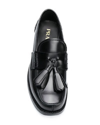Черные кожаные лоферы с кисточками от Prada