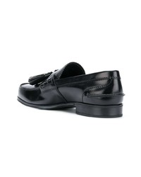 Черные кожаные лоферы с кисточками от Prada