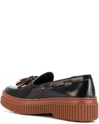 Женские черные кожаные лоферы с кисточками от Tod's