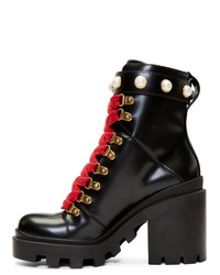 Черные кожаные массивные ботильоны на шнуровке от Gucci