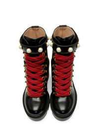 Черные кожаные массивные ботильоны на шнуровке от Gucci