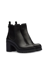 Черные кожаные массивные ботильоны от Prada