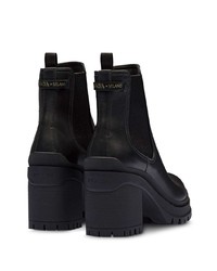 Черные кожаные массивные ботильоны от Prada