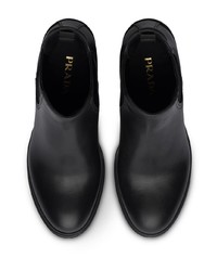 Черные кожаные массивные ботильоны от Prada