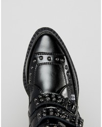 Черные кожаные массивные ботильоны от T.U.K.