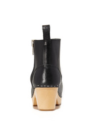 Черные кожаные массивные ботильоны от Swedish Hasbeens