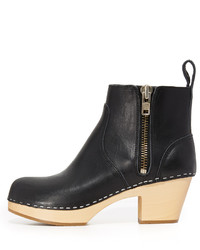 Черные кожаные массивные ботильоны от Swedish Hasbeens