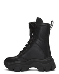 Женские черные кожаные массивные ботинки на шнуровке от Prada