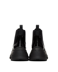 Женские черные кожаные массивные ботинки челси от Prada