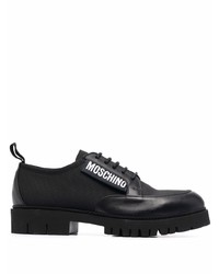 Черные кожаные массивные туфли дерби от Moschino
