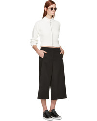 Женские черные кожаные низкие кеды от MM6 MAISON MARGIELA