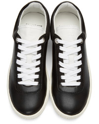 Женские черные кожаные низкие кеды от Courreges