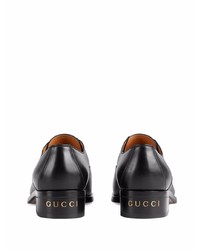 Черные кожаные оксфорды от Gucci