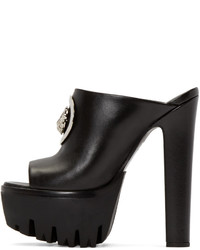 Черные кожаные сабо от Versus