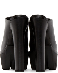 Черные кожаные сабо от Versus