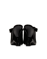 Черные кожаные сабо от Prada