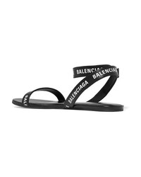 Черные кожаные сандалии на плоской подошве с принтом от Balenciaga