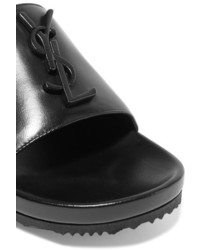 Черные кожаные сандалии на плоской подошве с украшением от Saint Laurent
