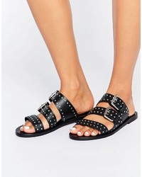Черные кожаные сандалии на плоской подошве с шипами от Sol Sana