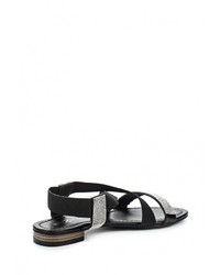 Черные кожаные сандалии на плоской подошве от Amazonga