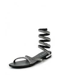 Черные кожаные сандалии на плоской подошве от Amazonga