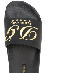 Черные кожаные сандалии на плоской подошве от Dolce & Gabbana