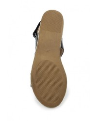 Черные кожаные сандалии на плоской подошве от Caprice