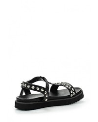 Черные кожаные сандалии на плоской подошве от Catisa