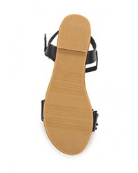 Черные кожаные сандалии на плоской подошве от Catisa