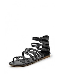 Черные кожаные сандалии на плоской подошве от Catisa